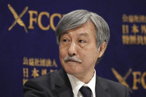 Dr. Naoto Ueyama, chairman of Japan Doctors Union, attends a press conference Thursday, May 27, 2021, in Tokyo. Dr. Ueyama warned Thursday that holding the one-year-delayed Tokyo Olympics in two months could lead to the spread of mutant variants of the coronavirus. (AP Photo/Eugene Hoshiko)