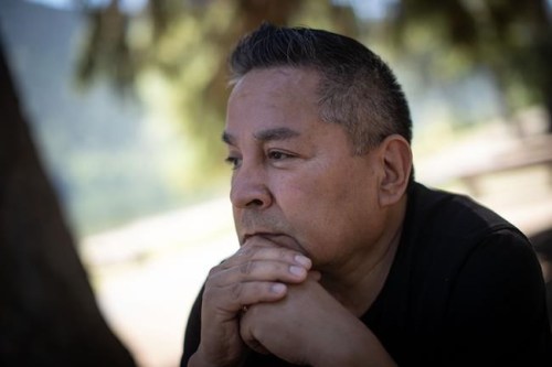 Kamloops Indian Residential School survivor Garry Gottfriedson pauses during an interview at Paul Lake near Kamloops, B.C., on Tuesday, June 1, 2021. A First Nation says the remains of 215 children have been discovered buried near the former school. THE CANADIAN PRESS/Darryl Dyck