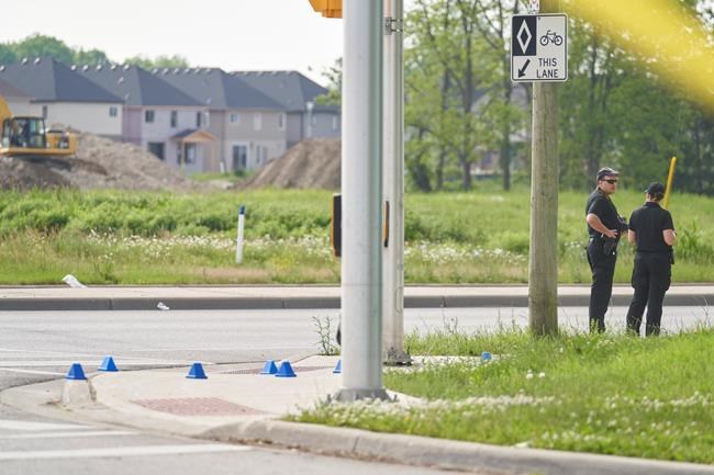 London Police investigate the scene of a car crash in London, Ontario on Monday, June 7, 2021. Police in London, Ont., say four people have died after several pedestrians were struck by a car Sunday night.THE CANADIAN PRESS/Geoff Robins