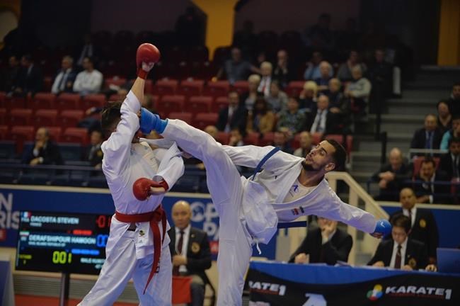 Hamoon Derafshipour is seen during a karate competition in an undated handout photo. Derafshipour, who is based in Kitchener, Ont., is originally from Iran and was selected to the IOC's 29-member Olympic Refugee Team earlier this week. THE CANADIAN PRESS/HO-Canadian Olympic Committee, *MANDATORY CREDIT*