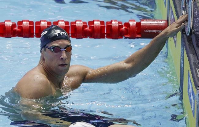FILE - In this Monday, July 22, 2019 file photo, United States' Matt Grevers reacts after his swim in the men's 100m backstroke semifinal at the World Swimming Championships in Gwangju, South Korea. Grevers finished sixth in the 100-meter backstroke final at the U.S. Olympic trials on Tuesday night, June 15, 2021 dashing his bid for a third games. (AP Photo/Mark Schiefelbein, File)