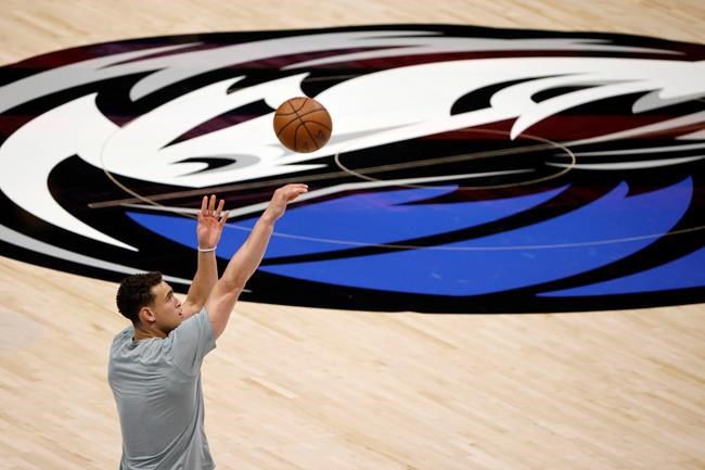 Dallas Mavericks center Dwight Powell (7) takes a warmup shot prior to playing the Los Angeles Clippers in Game 6 of an NBA basketball first-round playoff series in Dallas on June 4, 2021. THE CANADIAN PRESS/AP, Michael Ainsworth