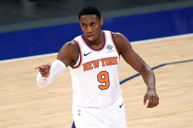 New York Knicks' RJ Barrett reacts after scoring during the second half against the Charlotte Hornets in an NBA basketball game in New York on April 20, 2021. THE CANADIAN PRESS/AP, Sarah Stier - POOL