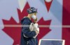 Summer McIntosh arrives for the Women’s 200m Freestyle at the 2020 Olympic Swimming Trials in Toronto, Sunday, June 20, 2021. The 14-year-old McIntosh will be among Canada's youngest Olympians in Tokyo, if not the youngest. THE CANADIAN PRESS/Frank Gunn