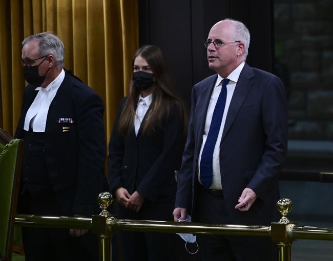 President of the Public Health Agency of Canada Iain Stewart, right, approaches the bar in the House of Commons to be admonished by the Speaker of the House of Commons Anthony Rota on Parliament Hill in Ottawa on Monday, June 21, 2021. THE CANADIAN PRESS/Sean Kilpatrick