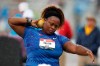 FILE - Michelle Carter sets to throw during the women's shot put at the U.S. Championships athletics meet in Des Moines, Iowa, in this Sunday, July 28, 2019, file photo. Reigning Olympic shot put champion Michelle Carter won't compete at the U.S. track and field trials after having a benign tumor removed from her right ankle. The 35-year-old will cheer on her friends and fellow competitors. (AP Photo/Charlie Neibergall, File)