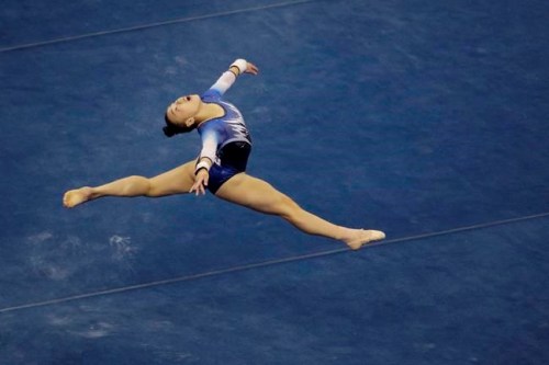 FILE - Emily Lee competes in the floor exercise during the senior women's competition at the 2019 U.S. Gymnastics Championships in Kansas City, Mo., in this Friday, Aug. 9, 2019, file photo. Lee is among the 18 women competing at the 2021 U.S. Olympic Trials in St. Louis starting on Friday night, June 25. (AP Photo/Charlie Riedel, File)