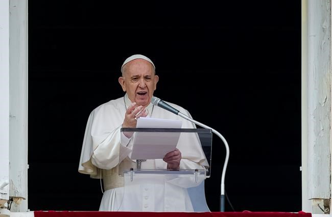 Pope Francis speaks from the window of his studio overlooking St. Peter's Square at The Vatican to a crowd of faithful and pilgrims gathered for the Sunday Angelus noon prayer, on June 6, 2021. THE CANADIAN PRESS/AP, Domenico Stinellis