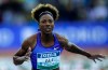 Nia Ali races during the Women's 60m Hurdles during the World Athletics Indoor Tour meeting in Madrid, Spain, Friday, Feb. 21, 2020. American track star Nia Ali says she knows what it's like to balance being a breastfeeding mom and an elite athlete.THE CANADIAN PRESS/AP/Manu Fernandez