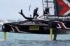 FILE - In this June 26, 2017, file photo, Emirates Team New Zealand helmsman Peter Burling, left, and teammate Blair Tuke cross the boat during the ninth race in America's Cup sailing competition against Oracle Team USA in Hamilton, Bermuda. As they hit what could be the prime of their careers, Burling, 30, and Tuke, 31, are thinking about more than just their next victory. Sure, they're focusing in on trying to win another gold medal in the high-performance 49er skiff in the Tokyo Olympics starting later this month. They also realize that as the victories pile up, they're in a unique position to speak out about protecting the planet's oceans. (AP Photo/Gregory Bull, File)
