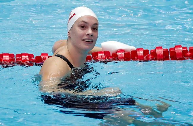Canada's Penny Oleksiak reacts after her heat of the women's 50m butterfly at the World Swimming Championships in Gwangju, South Korea, Friday, July 26, 2019. Canada is sending one of its largest teams ever to a Summer Olympics despite the pandemic challenges imposed on its athletes over the last year and a half. THE CANADIAN PRESS/AP-Lee Jin-man
