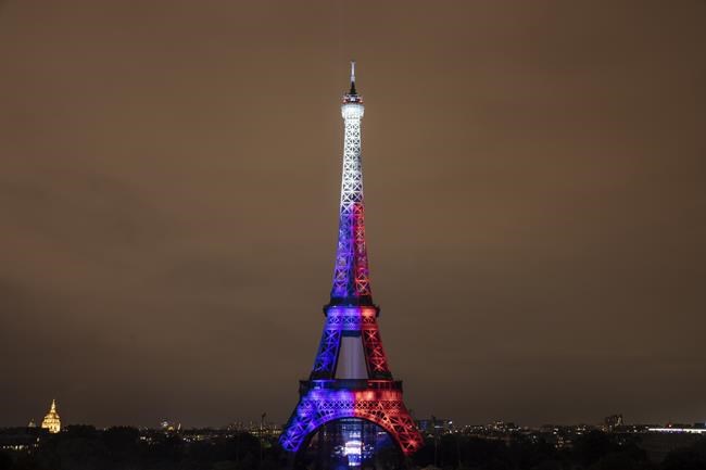 Fireworks illuminate the Eiffel Tower in Paris during Bastille Day celebrations late Wednesday, July 14, 2021. France celebrated its national holiday Wednesday with thousands of troops marching in a Paris parade, after last year's events were scaled back because of COVID-19 virus fears. (AP Photo/Lewis Joly)
