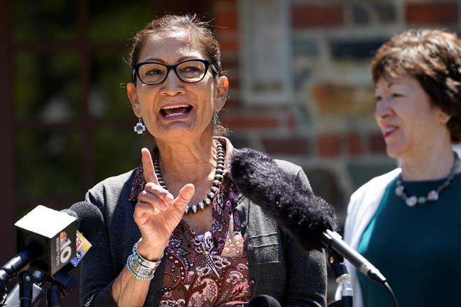 FILE-In this June 18, 2021 file photo, Interior Secretary Deb Haaland speaks to reporters during a visit to Acadia National Park in Winter Harbor, Maine. Haaland is visiting her home state this weekend, Saturday, July 17, to celebrate what marks the largest wilderness land donation in the agency's history. The donation from the Trust for Public Land increases the size of the Sabinoso Wilderness in northeastern New Mexico by nearly 50%. (AP Photo/Robert F. Bukaty, File)
