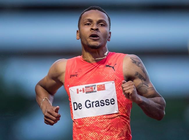 Andre De Grasse sprints to a third-place finish during the Canada-China challenge men's 100 metre race at the Harry Jerome International Track Classic, in Burnaby, B.C., on Tuesday, June 26, 2018. De Grasse headlines a strong Canadian track and field team at the Tokyo Games. THE CANADIAN PRESS/Darryl Dyck