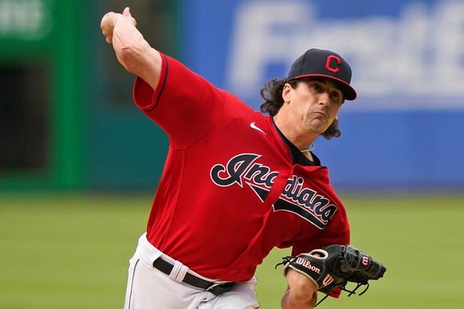 Cleveland Indians starting pitcher Cal Quantrill delivers in the first inning of the team's baseball game against the Tampa Bay Rays, Thursday, July 22, 2021, in Cleveland. (AP Photo/Tony Dejak)