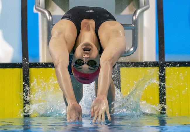 Kylie Masse swims her way to first place in the Women’s 200m Backstroke at the Olympic Swimming Trials in Toronto on Wednesday June 23, 2021. THE CANADIAN PRESS/Frank Gunn