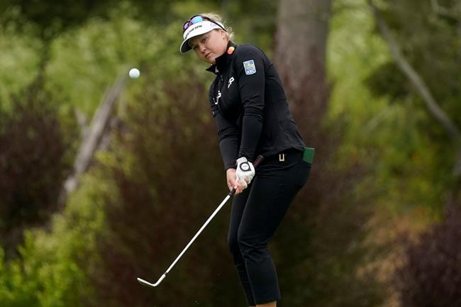 Brooke Henderson, of Canada, chips onto the 14th green during the second round of the U.S. Women's Open golf tournament at The Olympic Club, Friday, June 4, 2021, in San Francisco. THE CANADIAN PRESS/AP, Jeff Chiu