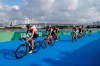 Left to right, Jonathan Brownlee of Great Britain (54), Kenji Nener of Japan (30),Vincent Luis of France (7), Marten van Riel of Belgium (27), Henri Schoeman of South Africa (51), Tyler Mislawchuk of Canada (15), Vincent Luis of France (7), Jonas Schomburg of Germany (4) and Dmitry Polyanskiy of the Russian Olympic Committee (8) chase the lead group during the cycling leg of the men's individual triathlon at the 2020 Summer Olympics, Monday, July 26, 2021, in Tokyo, Japan. (AP Photo/Jae C. Hong)