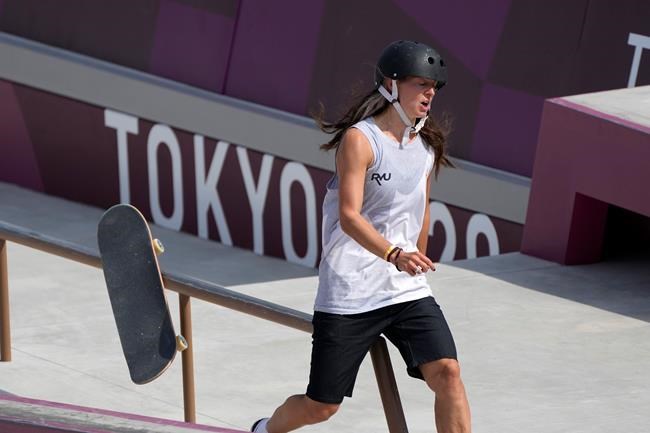 Annie Guglia of Canada loses control of the skateboard as she competes in the women's street skateboarding finals at the 2020 Summer Olympics, Monday, July 26, 2021, in Tokyo, Japan. THE CANADIAN PRESS/AP/Ben Curtis