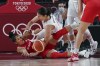Team Canada forward Miranda Ayim (9) battles for the ball against Team Serbia forward Jelena Brooks (9) during second half Olympic basketball action at the Tokyo Olympics in Tokyo, Japan on Monday, July 26, 2021. THE CANADIAN PRESS/Nathan Denette