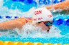 Margaret Mac Neil, of Canada, competes in the women's 100m butterfly semifinal during the Tokyo Olympics in Tokyo, Japan on Sunday, July 25, 2021. THE CANADIAN PRESS/Frank Gunn