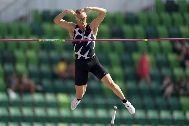 FILE - In this June 21, 2021, file photo, Sam Kendricks competes during the finals of the men's pole vault at the U.S. Olympic Track and Field Trials in Eugene, Ore. American world-champion pole vaulter Kendricks will miss the Olympics after testing positive for COVID-19. (AP Photo/Charlie Riedel, File)