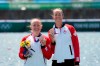 Caileigh Filmer (left) and Hillary Janssens of Canada pose with their bronze medals during the medal ceremony for the women's rowing pair final at the 2020 Summer Olympics, Thursday, July 29, 2021, in Tokyo, Japan. THE CANADIAN PRESS/AP/Lee Jin-man