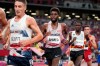 Mohammed Ahmed, centre, of Canada, runs in the men's 10,000-meters final at the 2020 Summer Olympics, in Tokyo, Friday, July 30, 2021. Ahmed looked headed for a medal, but he couldn't maintain the pace and faded over the final 300 metres to finish sixth in the 10,000 on Friday at the Tokyo Olympics, his first time racing the distance since the 2019 world championships. THE CANADIAN PRESS/AP-Matthias Schrader