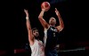 France's Nicolas Batum (5), right, shoots over Iran's Mohammadsamad Nik Khahbahrami (14) during men's basketball preliminary round game at the 2020 Summer Olympics, Saturday, July 31, 2021, in Saitama, Japan. (AP Photo/Eric Gay)