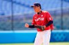 Japan's Ryoji Kuribayashi reacts after Japan won a baseball game against Mexico at Yokohama Baseball Stadium during the 2020 Summer Olympics, Saturday, July 31, 2021, in Yokohama, Japan. (AP Photo/Matt Slocum)