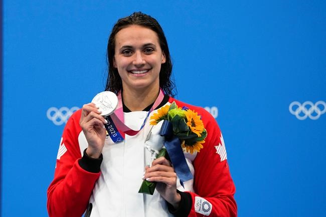 Kylie Masse, of Canada, poses after winning the silver medal in the women's 200-meter backstroke final at the Tokyo Summer Olympic Games, in Tokyo, Saturday, July 31, 2021. THE CANADIAN PRESS/AP-Gregory Bull