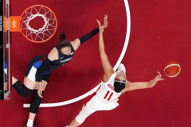 Canada's Natalie Achonwa (11) grabs a rebound over South Korea's Ji Su Park during a women's basketball preliminary round game at the Tokyo Summer Olympic Games, in Saitama, Japan, Thursday, July 29, 2021. THE CANADIAN PRESS/AP-Brian Snyder, POOL