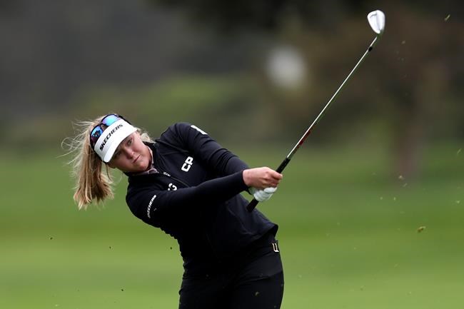 Brooke Henderson, of Canada, hits from the 17th fairway during the second round of the U.S. Women's Open golf tournament at The Olympic Club in San Francisco, Friday, June 4, 2021. Canada's Brooke Henderson and Alena Sharp are heading into the women's golf tournament at the Tokyo Olympics having learned valuable lessons from the experiences of their male teammates. THE CANADIAN PRESS/AP-Jed Jacobsohn