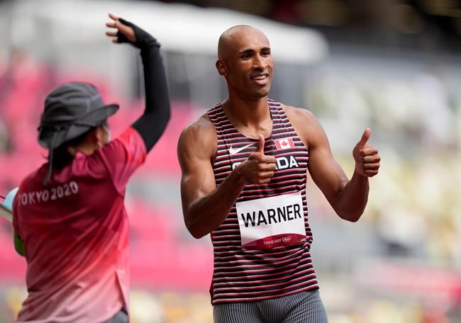 Damian Warner of Canada reacts after finishing the decathlon 100 metres at the 2020 Summer Olympics, Wednesday, Aug. 4, 2021, in Tokyo, Japan. THE CANADIAN PRESS/AP-Martin Meissner