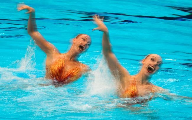 Claudia Holzner and Jacqueline Simoneau of Canada compete in the duet technical routine at the the 2020 Summer Olympics, Tuesday, Aug. 3, 2021, in Tokyo, Japan. THE CANADIAN PRESS/AP/Dmitri Lovetsky