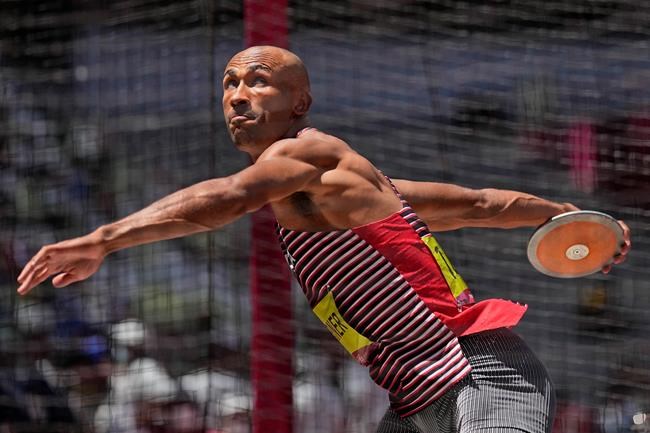 Damian Warner, of Canada, competes in the decathlon discus throw at the 2020 Summer Olympics, Thursday, Aug. 5, 2021, in Tokyo. THE CANADIAN PRESS/AP-David J. Phillip