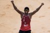 Ahmed Tijan, of Qatar, celebrates winning a men's beach volleyball Bronze Medal match against Latvia at the 2020 Summer Olympics, Saturday, Aug. 7, 2021, in Tokyo, Japan. (AP Photo/Petros Giannakouris)