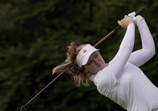 Brooke Henderson, of Canada, watches her tee shot on the second hole during the first round of the women's golf event at the 2020 Summer Olympics, Wednesday, Aug. 4, 2021, at the Kasumigaseki Country Club in Kawagoe, Japan. THE CANADIAN PRESS/AP-Matt York
