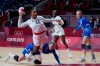France's Pauletta Foppa scores a goal during the women's gold medal handball match between the Russian Olympic Committee and France at the 2020 Summer Olympics, Sunday, Aug. 8, 2021, in Tokyo, Japan. (AP Photo/Sergei Grits)