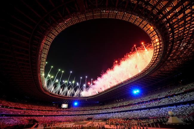 Fireworks explode following the closing ceremony in the Olympic Stadium at the 2020 Summer Olympics, Sunday, Aug. 8, 2021, in Tokyo, Japan. Another Olympic Games with more layers of dissent and debate than Tokyo are less than six months away in Beijing. THE CANADIAN PRESS/AP/Aaron Favila