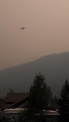 A helicopter is shown near the White Rock Lake wildfire near Westwold, B.C., in this recent handout photo. THE CANADIAN PRESS/HO - Brenda Geisbrecht