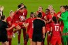 Canada players including Christine Sinclair (holding ball) celebrate their win against Sweden during the women's soccer gold medal game at the Tokyo Olympics in Yokohama, Japan on Friday, Aug. 6, 2021. Sinclair was substituted in the second half of the gold-medal match, meaning she had to watch the penalty shootout that decided the game from the sidelines. THE CANADIAN PRESS/Adrian Wyld