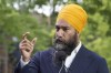 NDP Leader Jagmeet Singh responds to a question during a news conference in a park in Montreal, Sunday, Aug. 15, 2021. THE CANADIAN PRESS/Paul Chiasson