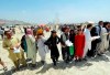 Hundreds of people gather outside the international airport in Kabul, Afghanistan, Tuesday, Aug. 17, 2021. Justin Trudeau is blaming Taliban checkpoints rather than government bureaucracy and delays for what many see as the slow pace of Canada’s effort to save former Afghan interpreters and their families. The prime minister and Liberal leader made the comments during an election campaign event in Vancouver today as fears and frustrations mount over the fate of hundreds of Afghans at risk of Taliban retribution for their links to Canada. THE CANADIAN PRESS/AP Photo