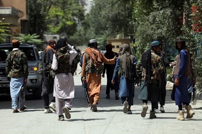 Taliban fighters patrol in the Wazir Akbar Khan neighborhood in the city of Kabul, Afghanistan, Wednesday, Aug. 18, 2021. THE CANADIAN PRESS/AP, Rahmat Gul