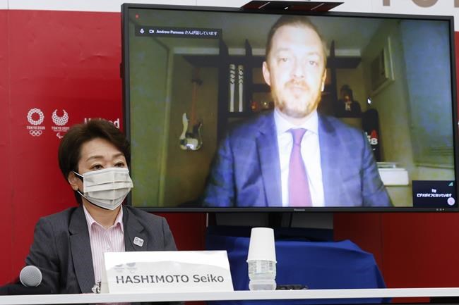 FILE - In this June 21, 2021, file photo, Tokyo 2020 President Seiko Hashimoto listens to International Paralympic Committee (IPC) President Andrew Parson, on a screen, during a five-party online meeting at Harumi Island Triton Square Tower Y in Tokyo. The opening next week of the Paralympic Games in Tokyo is being used as a stage to launch a human rights movement aimed at the world’s 1.2 billion people with disabilities.(Rodrigo Reyes Marin/Pool Photo via AP, File)