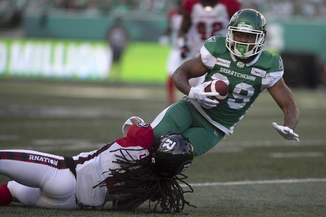 Saskatchewan Roughriders running back William Powell (29) runs the ball against the Ottawa Redblacks during first half CFL football action in Regina on Saturday, August 21, 2021. THE CANADIAN PRESS/Kayle Neis