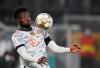 Bayern's Alphonso Davies controls the ball in the air during the German Supercup soccer match between Borussia Dortmund and Bayern Munich in Dortmund, Germany on August 17, 2021. THE CANADIAN PRESS/AP, Martin Meissner
