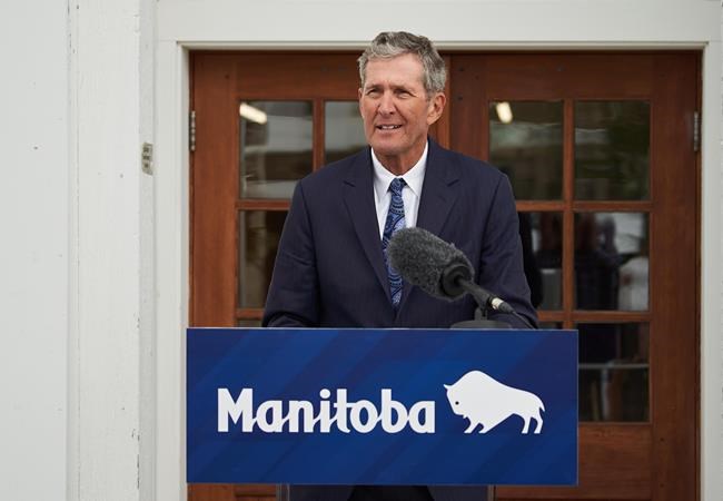 Manitoba Premier Brian Pallister announces that he will not be seeking re-election in front of the Dome Building in Brandon, Man., on Tuesday, Aug. 10, 2021. THE CANADIAN PRESS/David Lipnowski