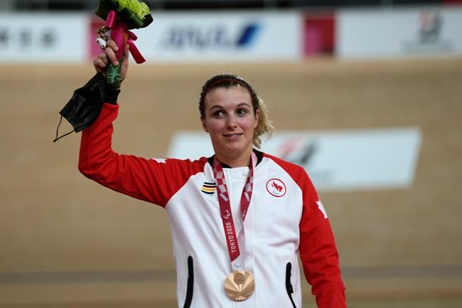 Canada's Keely Shaw poses with the bronze medal during the victory ceremony for the Cycling Track Women's C4 3000m Individual Pursuit at the Tokyo 2020 Paralympic Games, Wednesday, Aug. 25, 2021, in Izu, Shizuoka prefecture, Japan. THE CANADIAN PRESS/AP-Shuji Kajiyama